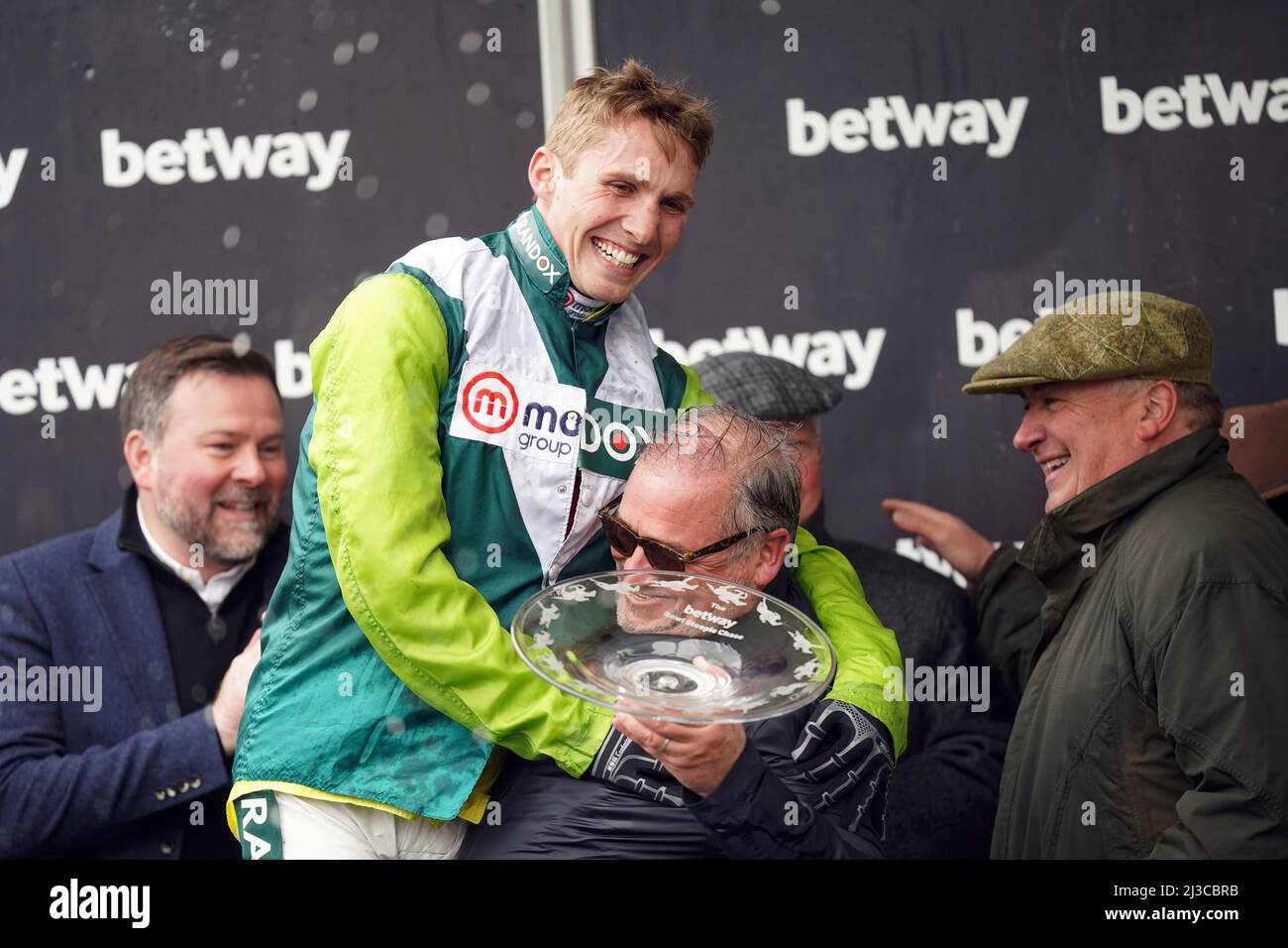 Ged Mason celebrates after his horse Clan Des Obeaux ridden by Harry Cobden (left) won the Betway Bowl Chase at Aintree Racecourse, Liverpool. Picture date: Thursday April 7, 2022. Stock Photo
