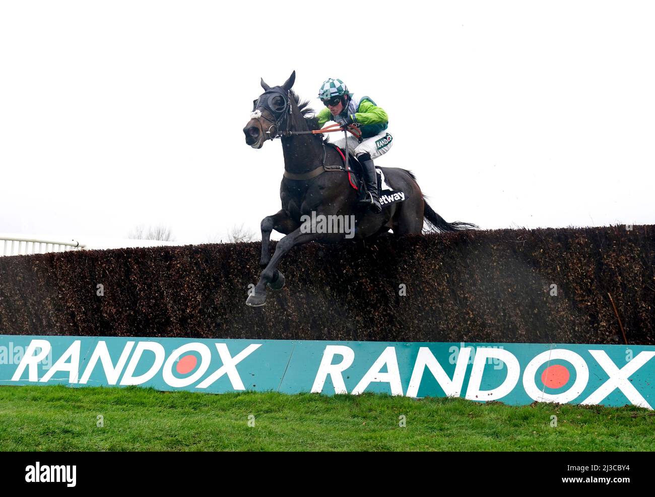 Clan Des Obeaux ridden by jockey Harry Cobden on their way to winning the Betway Bowl Chase at Aintree Racecourse, Liverpool. Picture date: Thursday April 7, 2022. Stock Photo