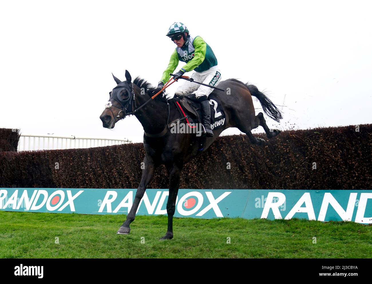 Clan Des Obeaux ridden by jockey Harry Cobden on their way to winning the Betway Bowl Chase at Aintree Racecourse, Liverpool. Picture date: Thursday April 7, 2022. Stock Photo