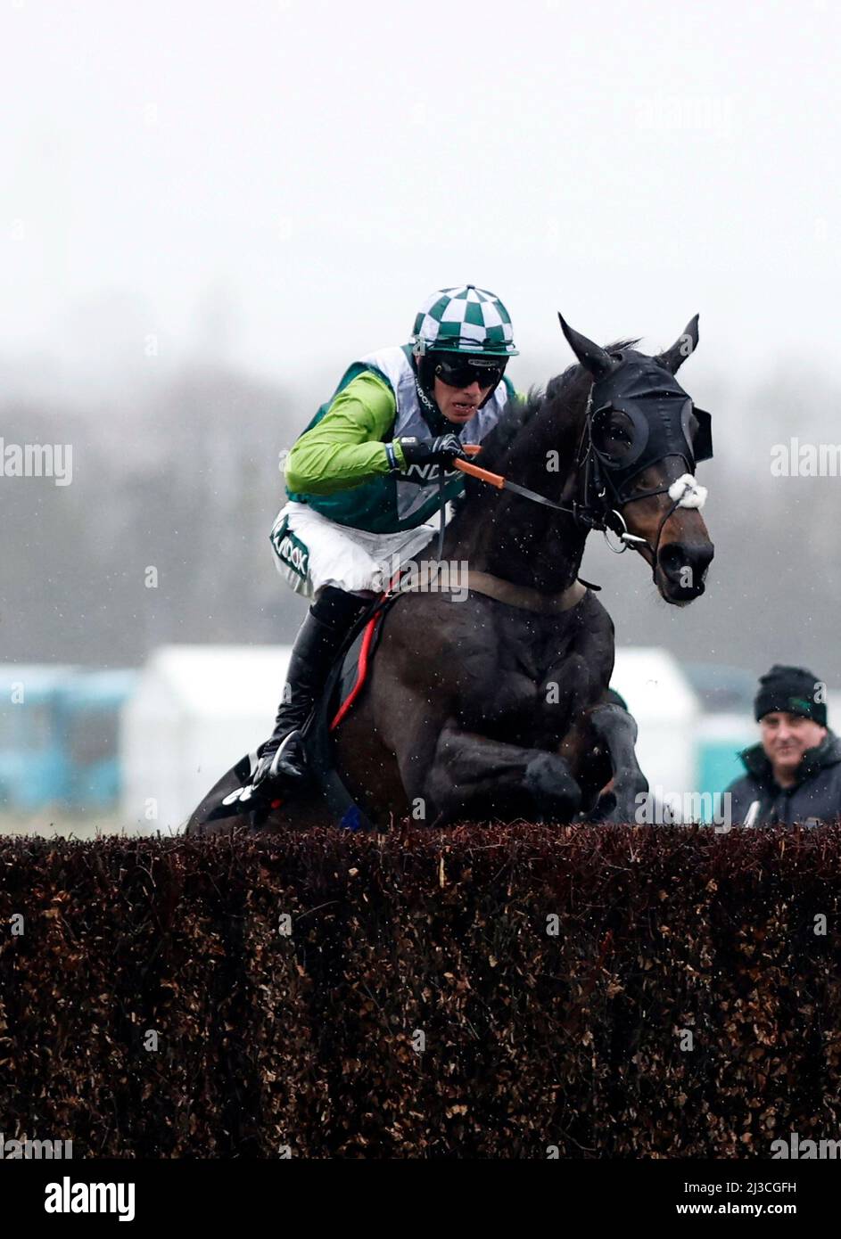 Aintree Racecourse. 7th Apr, 2022. Aintree, Merseyside, England: Grand National Festival, Day 1: Clan Des Obeaux ridden by Harry Cobden clears the final fence as it goes on to win The Betway Bowl Steeple Chase today. Credit: Action Plus Sports/Alamy Live News Stock Photo