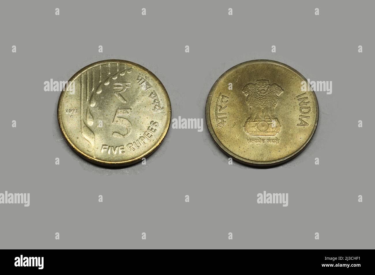 five rupees coin indian currency money old five rupees coin with white background 2J3CHF1