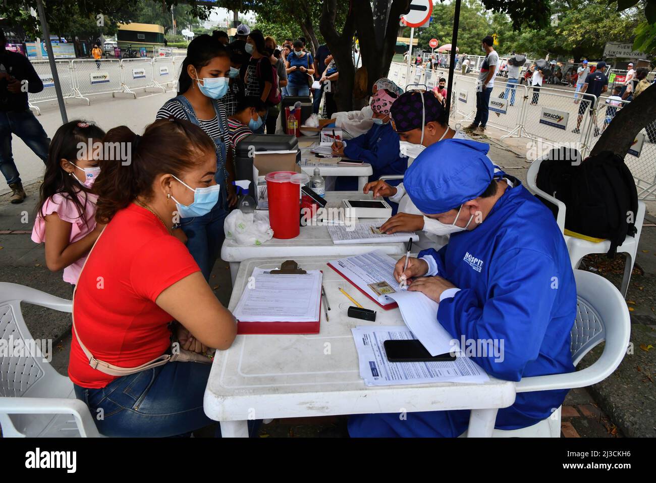 Cucuta, Colombia. 30th Mar, 2022. Health workers register patients during a vaccination day in the neighborhood of La Parada, near the Colombia-Venezuela border. 502 Colombian communities in the country already have more than 70% of their population with a complete vaccination schedule against covid-19, and lifted the measure of the use of face masks in open spaces. (Credit Image: © Jorge Castellanos/SOPA Images via ZUMA Press Wire) Stock Photo