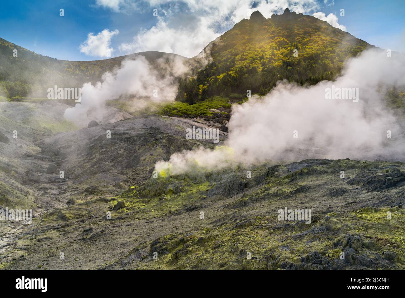 Volcanic activity, sulfur fumarole and hot gas on Kunashir Island, Kuril islands, Russia. Stock Photo