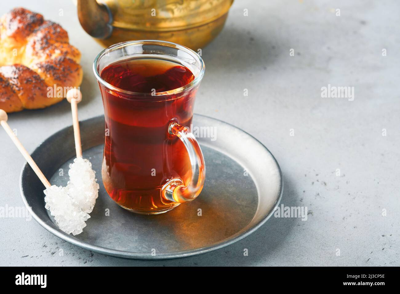 Turkish black tea. Glass cup of turkish black tea and crispy Turkish
