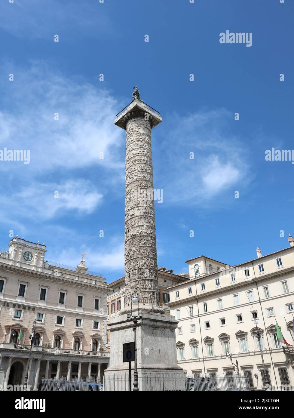 Rome, RM, Italy - August 18, 2020: Ancient Roman column and the Cigi Palace seat of italian government Stock Photo