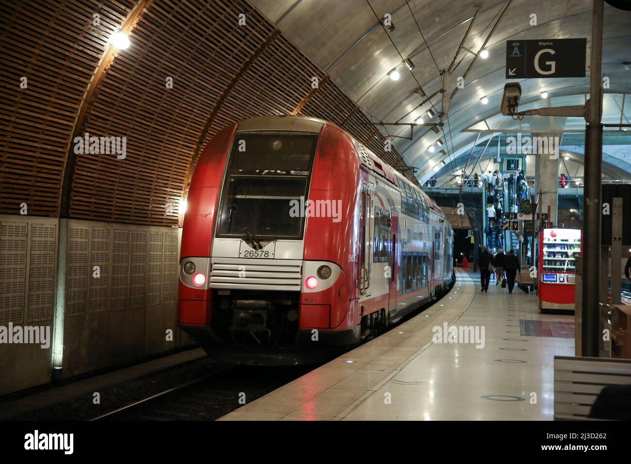 A SNCF TER double decker train leaves Monte-Carlo station. A train ride from Nice Ville to Monte ...