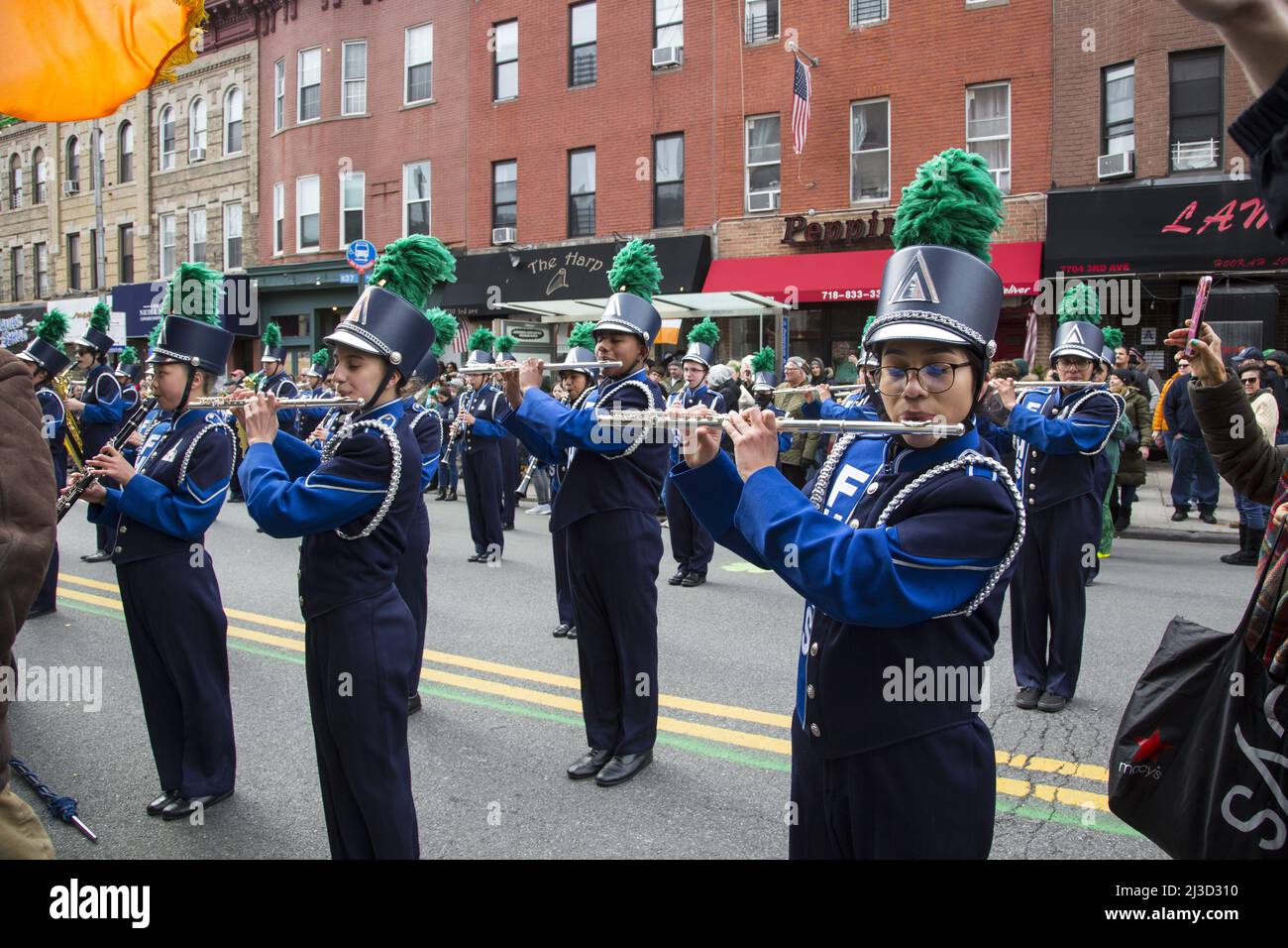 Members of the Fort Hamilton High School Marching Band proudly perform