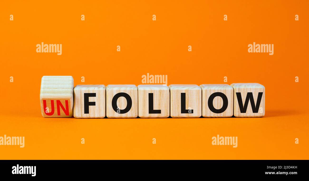 Follow or unfollow symbol. Turned wooden cubes and changed concept ...