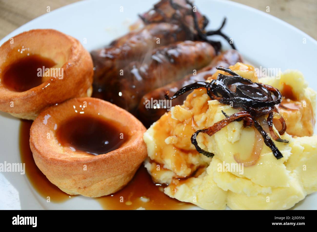 English sausage and mash. Bangers, mash and Yorkshire puddings with