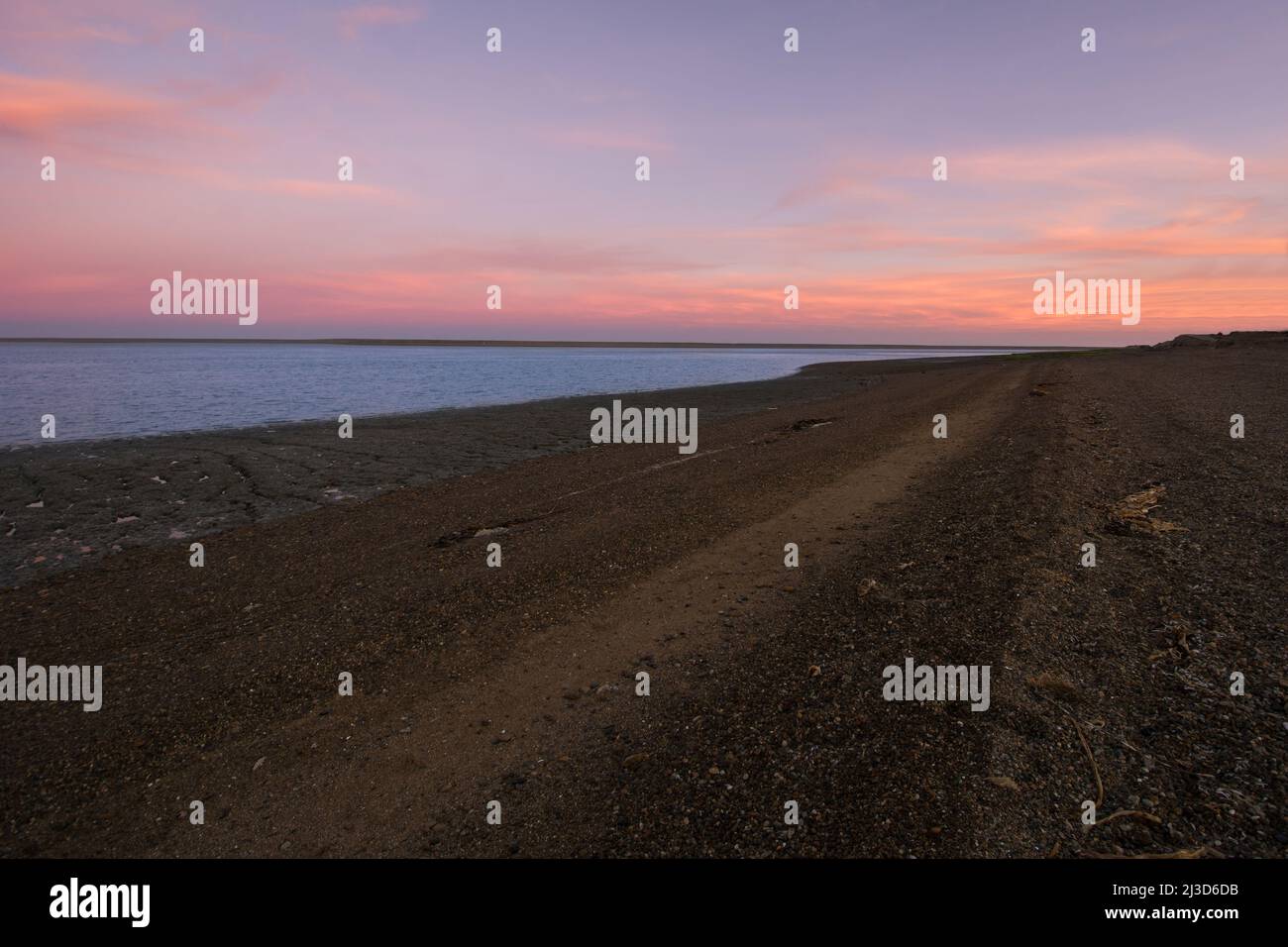 Sunset at low tide on the Atlantic coast Stock Photo