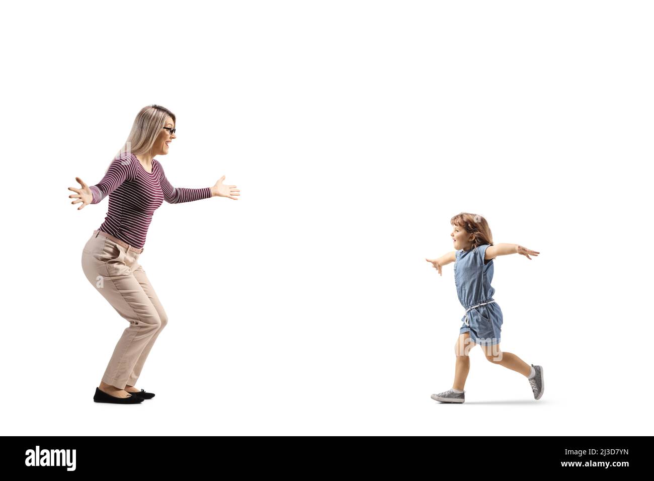 Full length profile shot of a child running towards mother isolated on white background Stock Photo