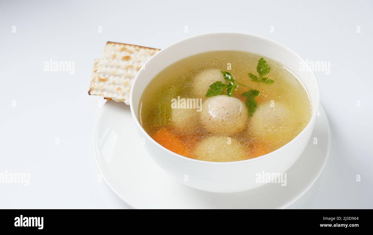 Jewish chicken broth with kneidlach (balls made with matzo meal)Matzo