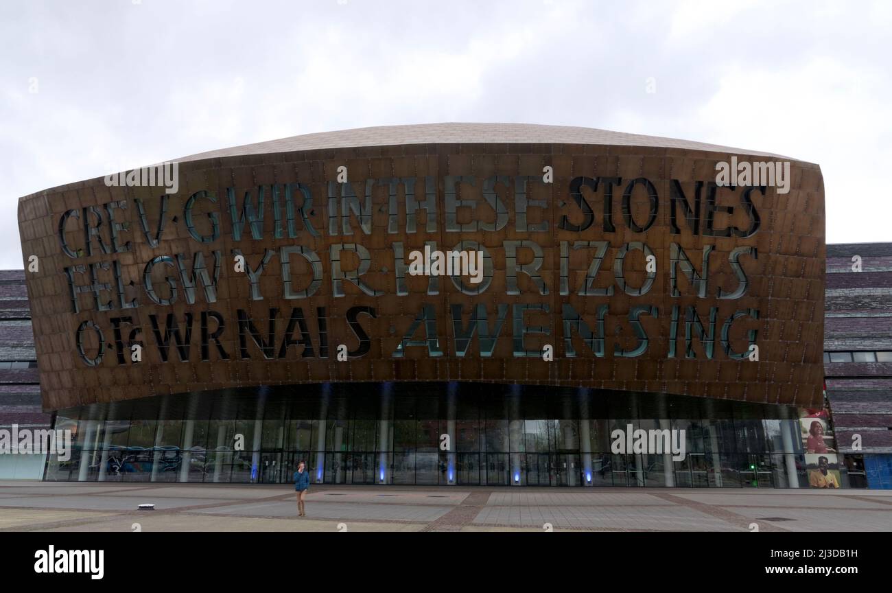 Cardiff Millennium Centre front view of main entrance with captioned frontage In These Stones Horizons Sing...Creu gwir fel gwydr o ffwrnais awen... Stock Photo