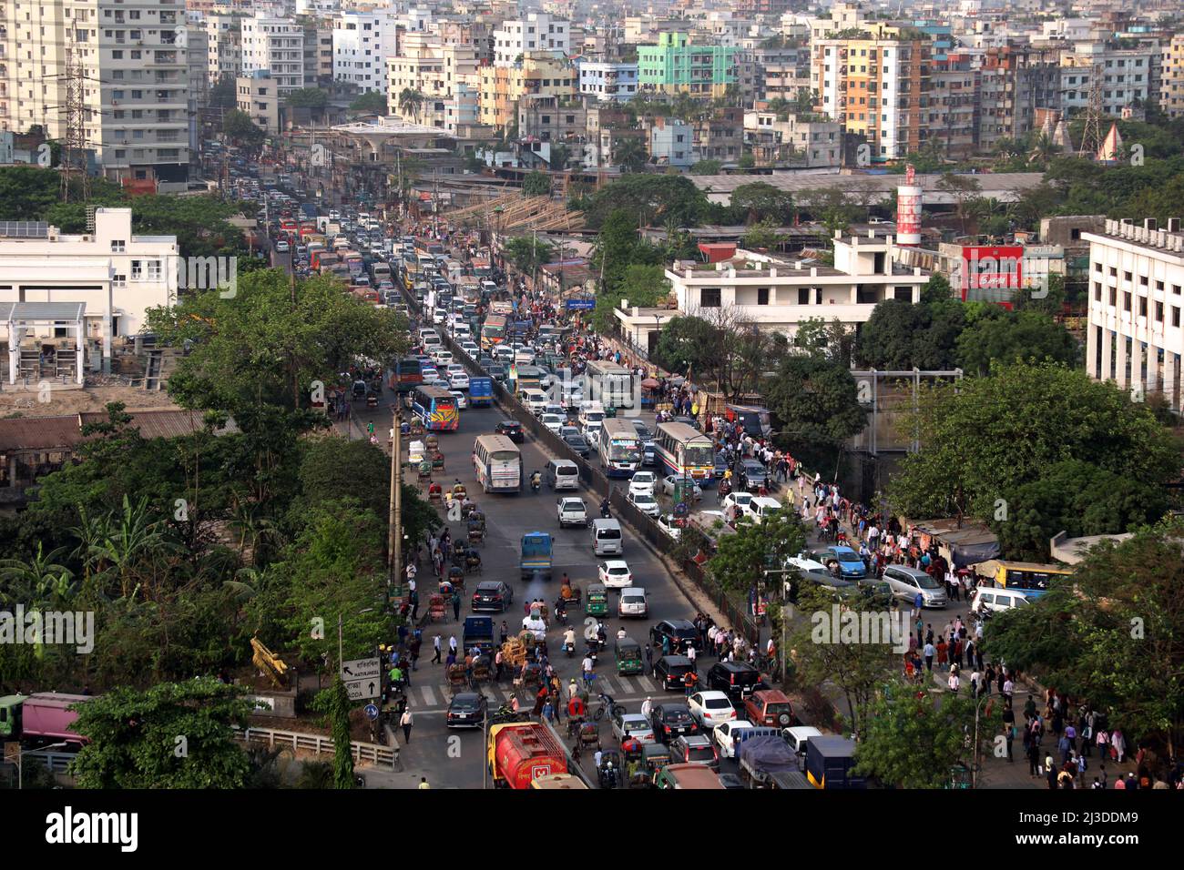 DHAKA,BANGLADESH,APRIL,07,2022 Commuters make their way through a