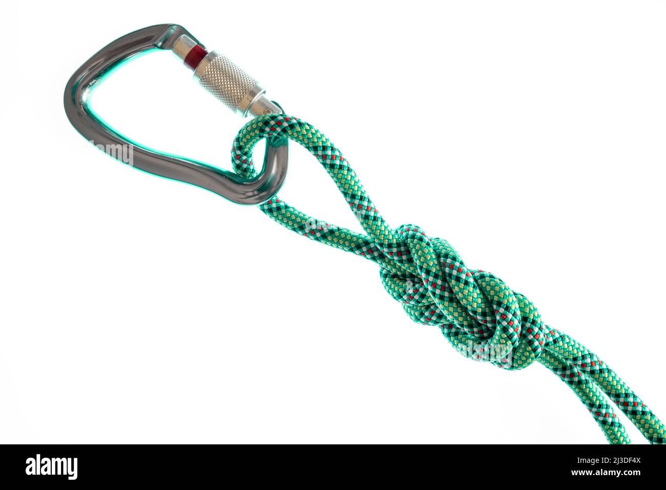 Rock climbing carabiner with locking gate and climbing rope Stock Photo