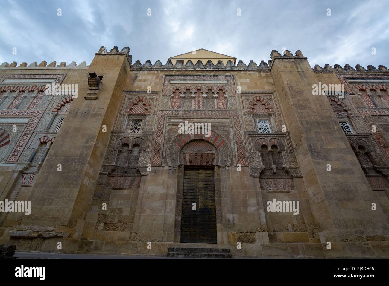 Medieval walls with ornament of old mosque in town Cordoba, Andalusia ...