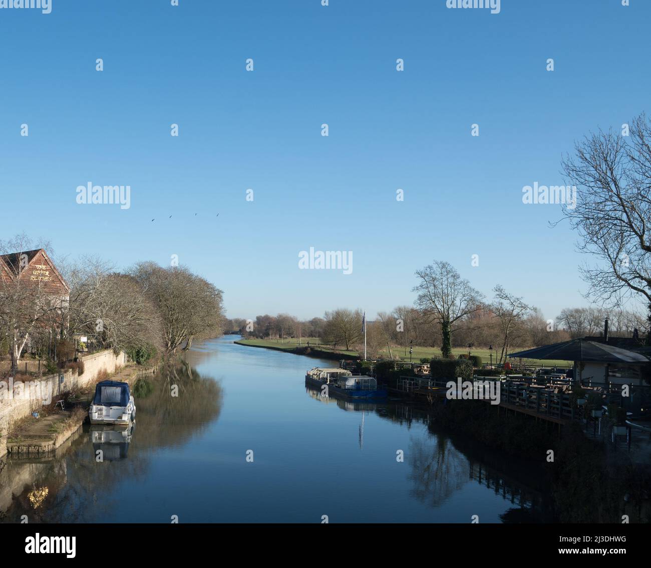View from Abingdon Bridge, Abingdon-On-Thames, Oxfordshire, showing a backwater of the River Thames with Nag's  Head Island on the right Stock Photo