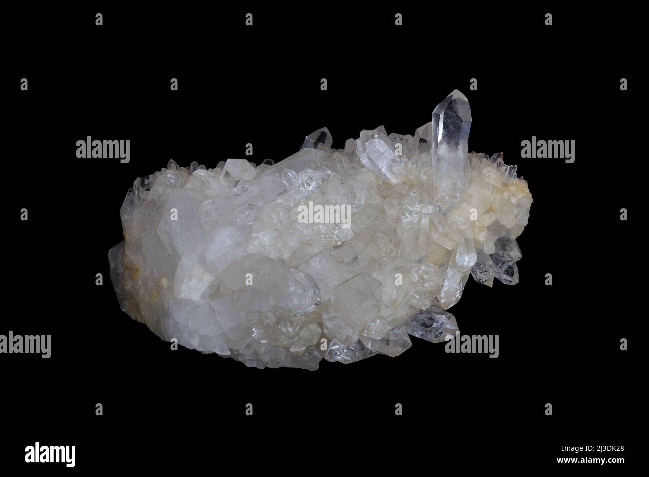 Quartz crystal, translucent mineral stone on black background Stock