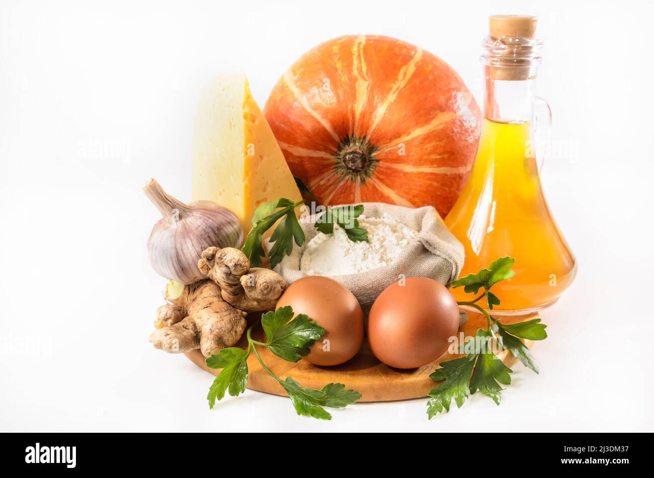 pumpkin and other ingredients for pumpkin casserole on a light background Stock Photo