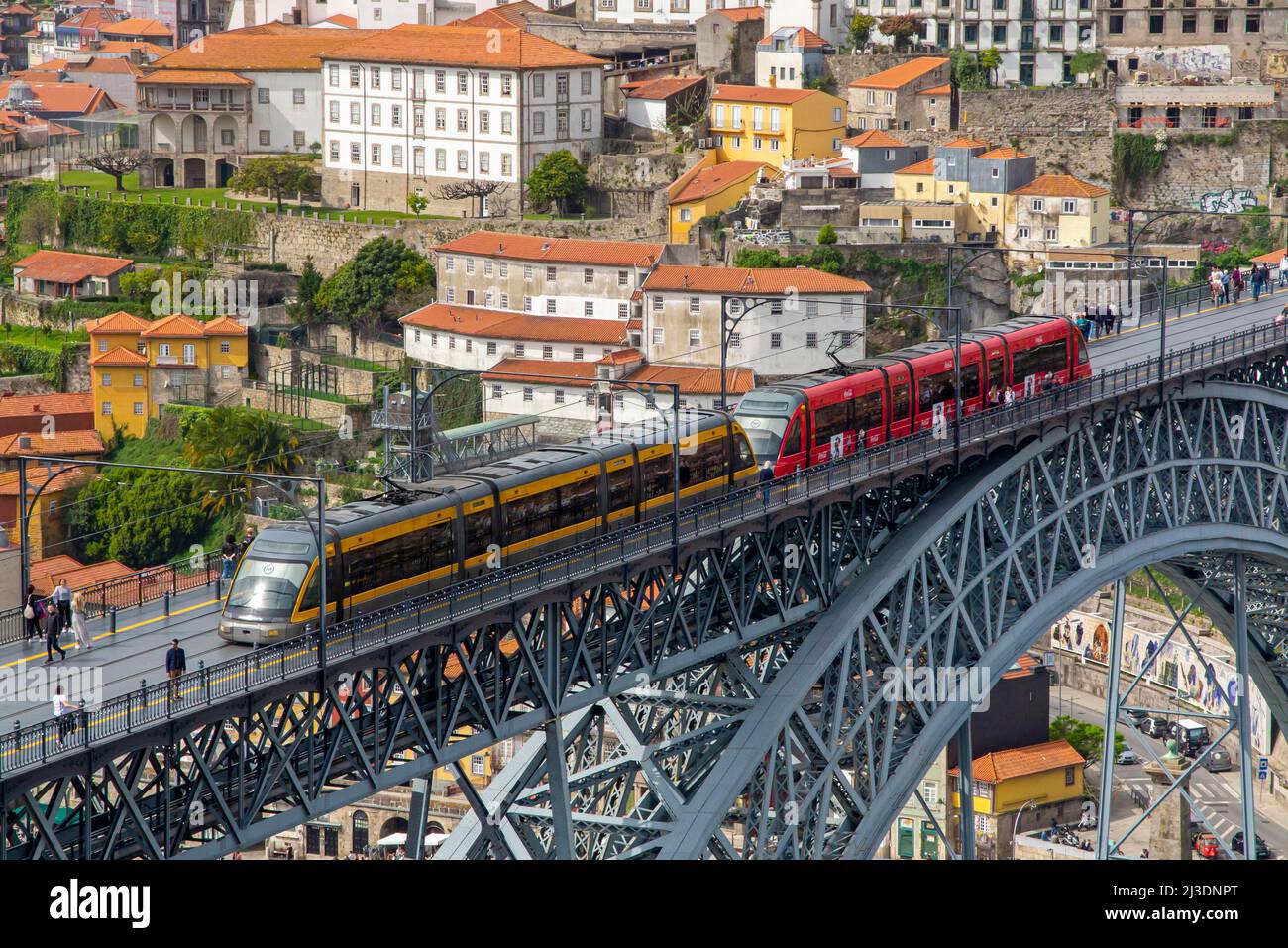 Metro do Porto tram crossing Pont Luiz 1 bridge over the River Douro Porto Portugal which was designed by Theophile Seyrig a partner of Gustave Eiffel Stock Photo