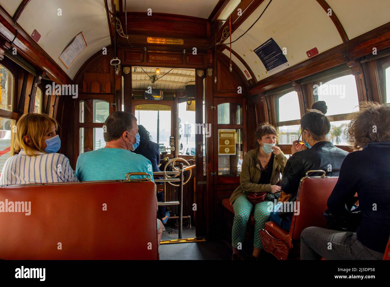 Passengers inside Porto tram 205 at Passeio Alegre in Foz at the mouth of the River Douro in Porto Portugal. Stock Photo