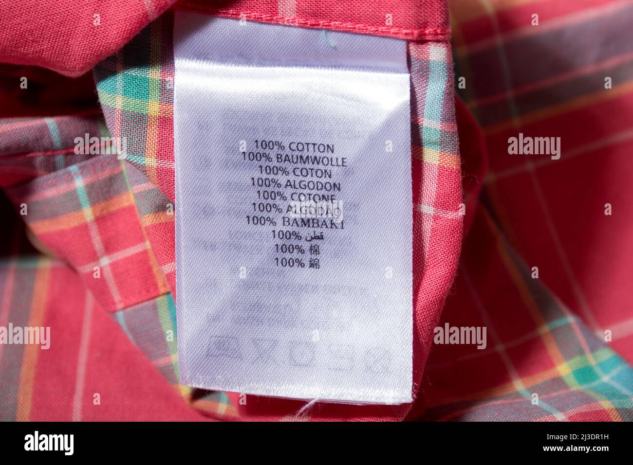 Clothing fabric material tag. Stock Photo