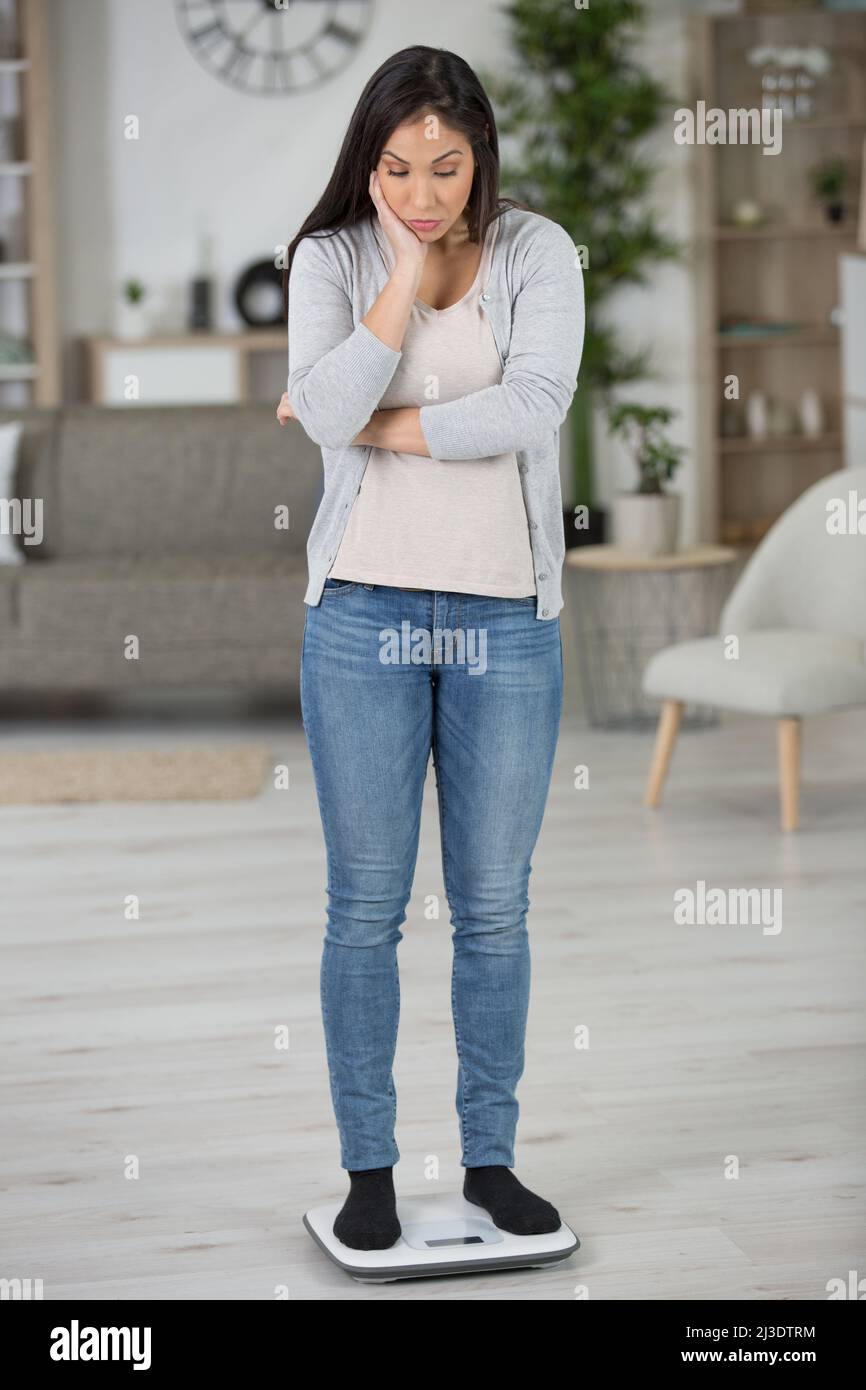woman worried about weight gain Stock Photo Alamy