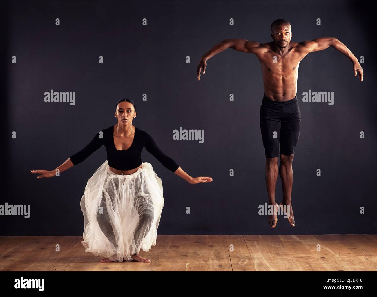 Flight A female and male contemporary dancer performing a dramatic Flight A female and male contemporary dancer performing a dramatic