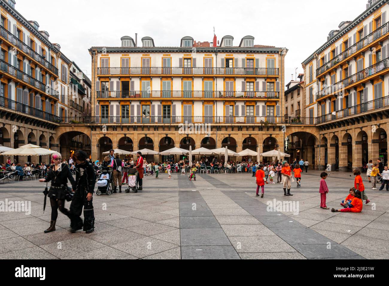 People spending the afternoon at the terraces bars, coffee shops  Plaza Constitucion Stock Photo