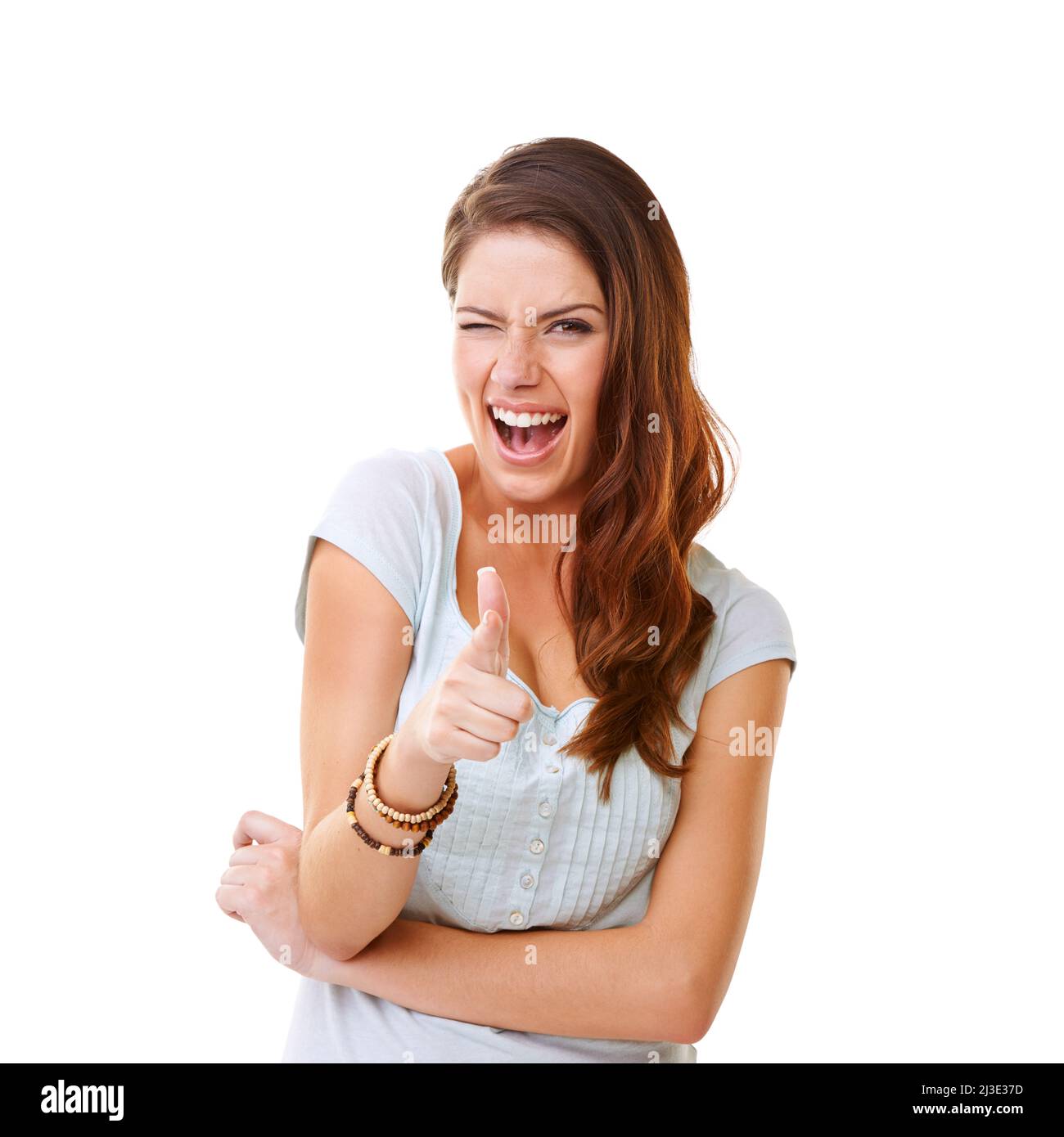 Portrait young woman winking pointing hi-res stock photography and ...