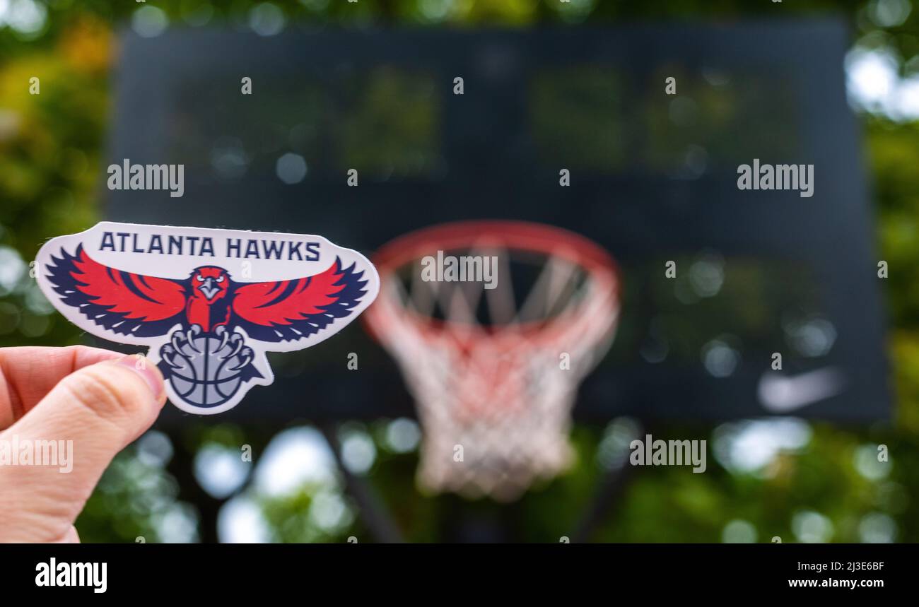September 15, 2021, Atlanta, USA, A man holds the emblem of the ...