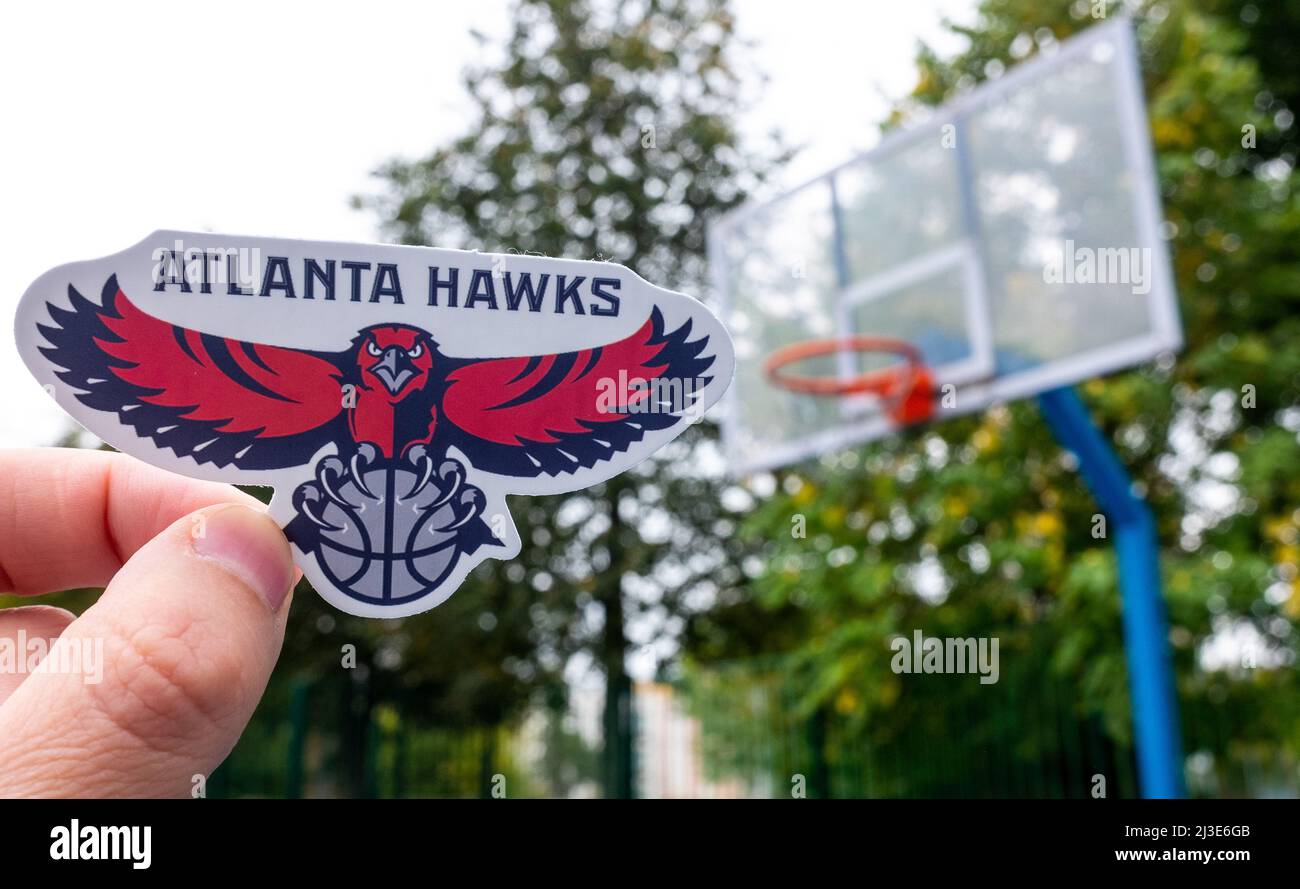 September 15, 2021, Atlanta, USA, A man holds the emblem of the ...