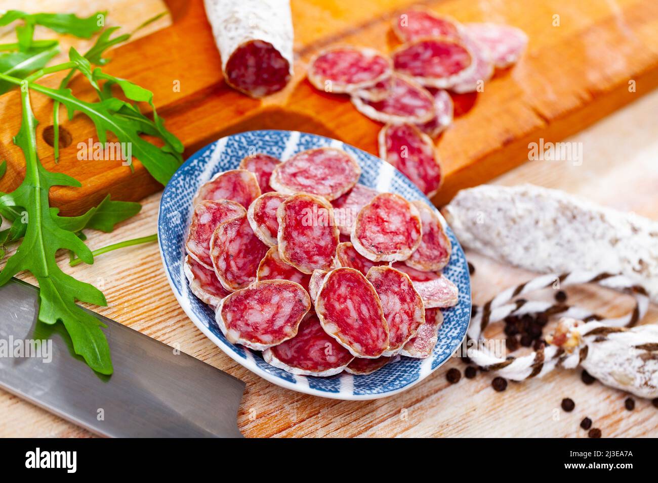 Sliced spanish sausage fuet Stock Photo Alamy