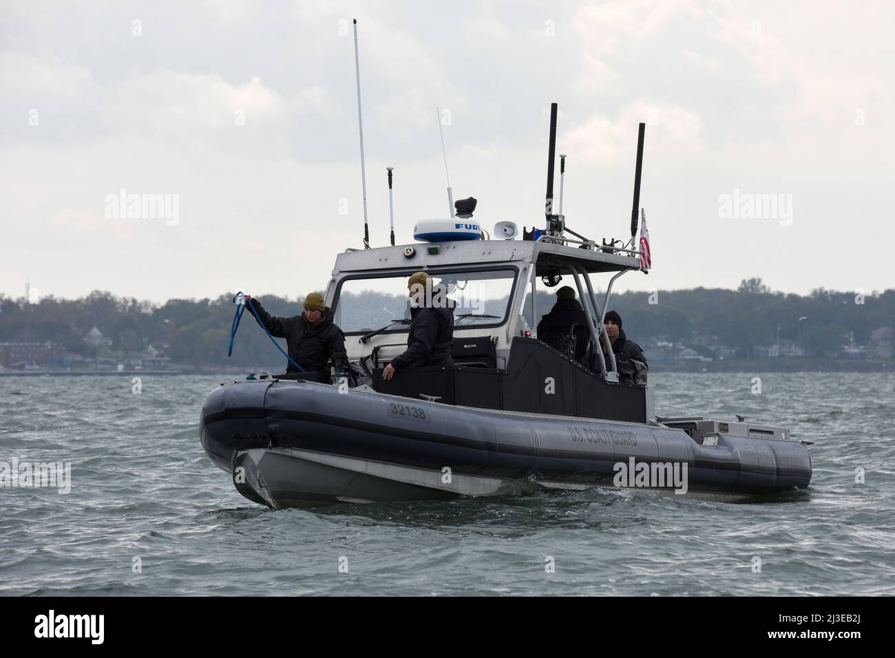 U.S. Coast Guard Petty Officer 3rd Class and Petty Officer 1st Class