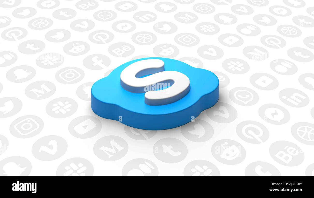 Abstract skype icon formed by many tiny round particles with social media symbols flowing behind. Motion. Concept of online services. For editorial Stock Photo