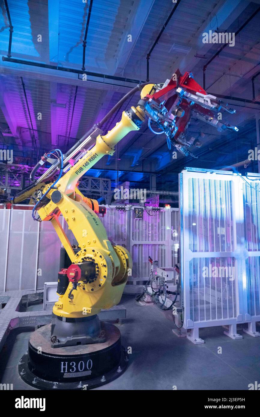 Austin Texas USA, April 7 2022: Robotic machines line the manufacturing line at the new Tesla Gigafactory Texas as invited guests tour the new Tesla Gigafactory Texas during its private grand opening event. The plant is the largest manufacturing facility in the U.S. and will gear up to turn out over 1,000 electric cars per day. Credit: Bob Daemmrich/Alamy Live News Stock Photo