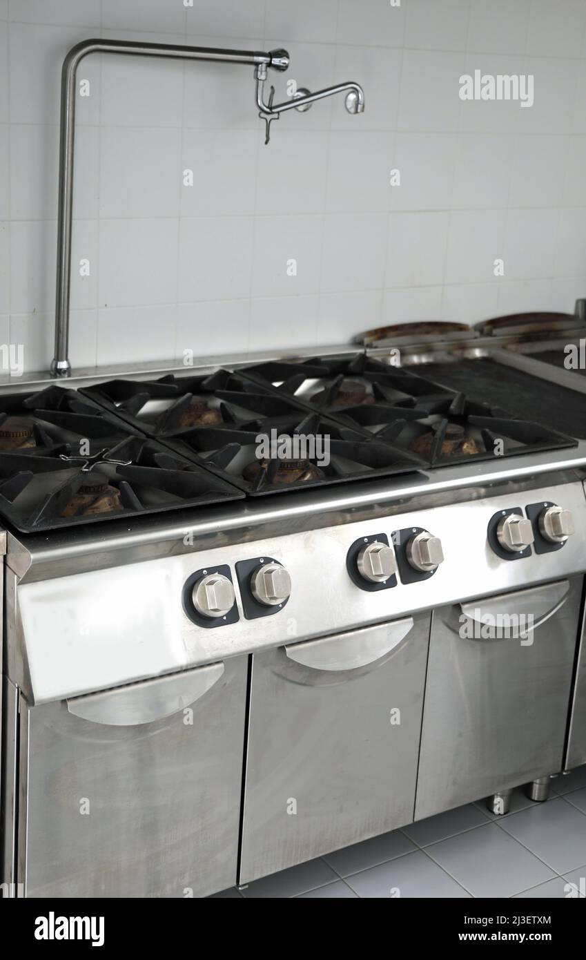 stoves in the industrial kitchen with stainless steel and a