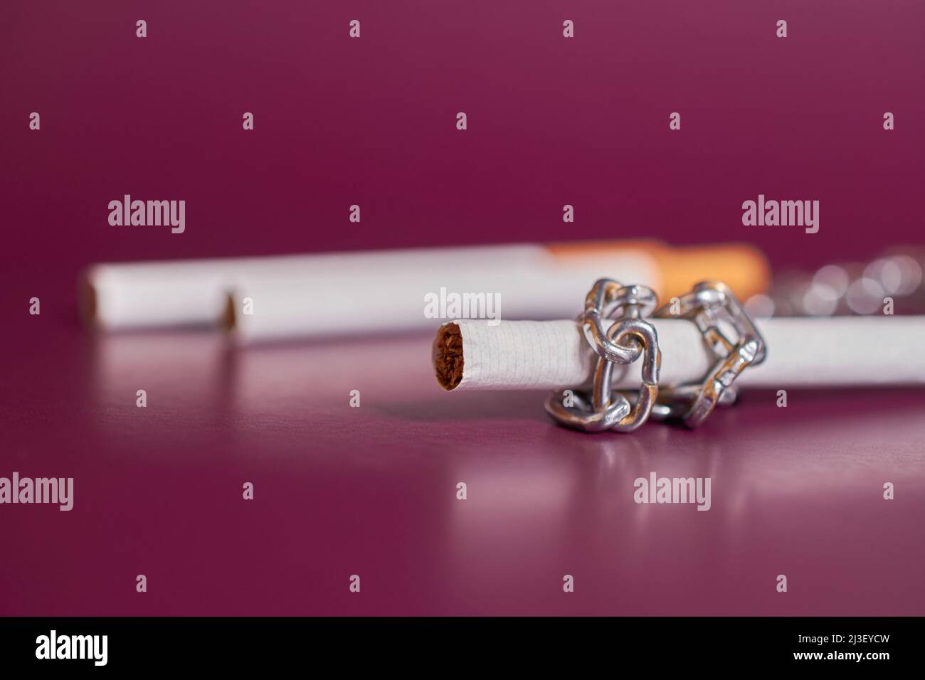 3 cigarettes Three people smoking cigarettes hi-res stock photography and images