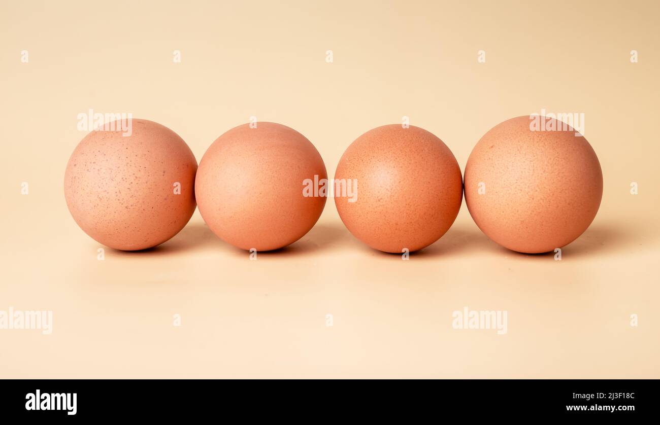 Easter concept. Brown-shelled farm eggs row. Organic natural eco food. High quality photo Stock Photo
