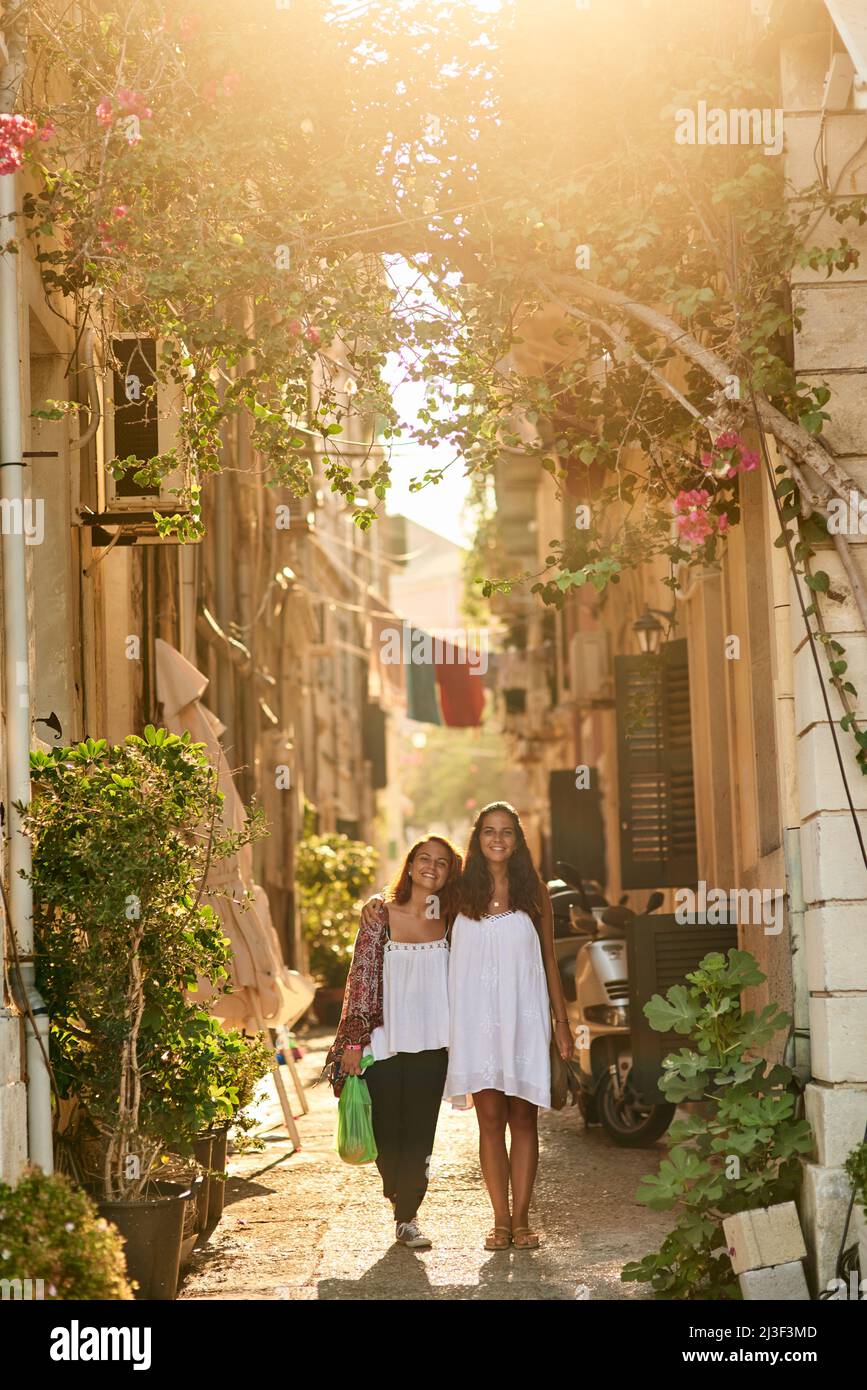 Seeing the sights with my sister. Full length portrait of two young sisters travelling in a foreign city. Stock Photo
