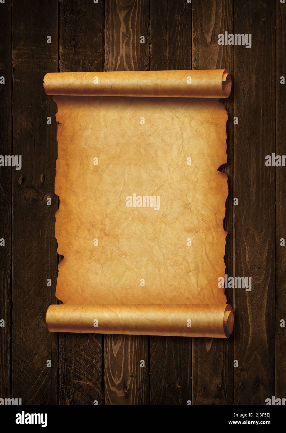 Old mediaeval paper sheet. Parchment scroll isolated on a wood board ...