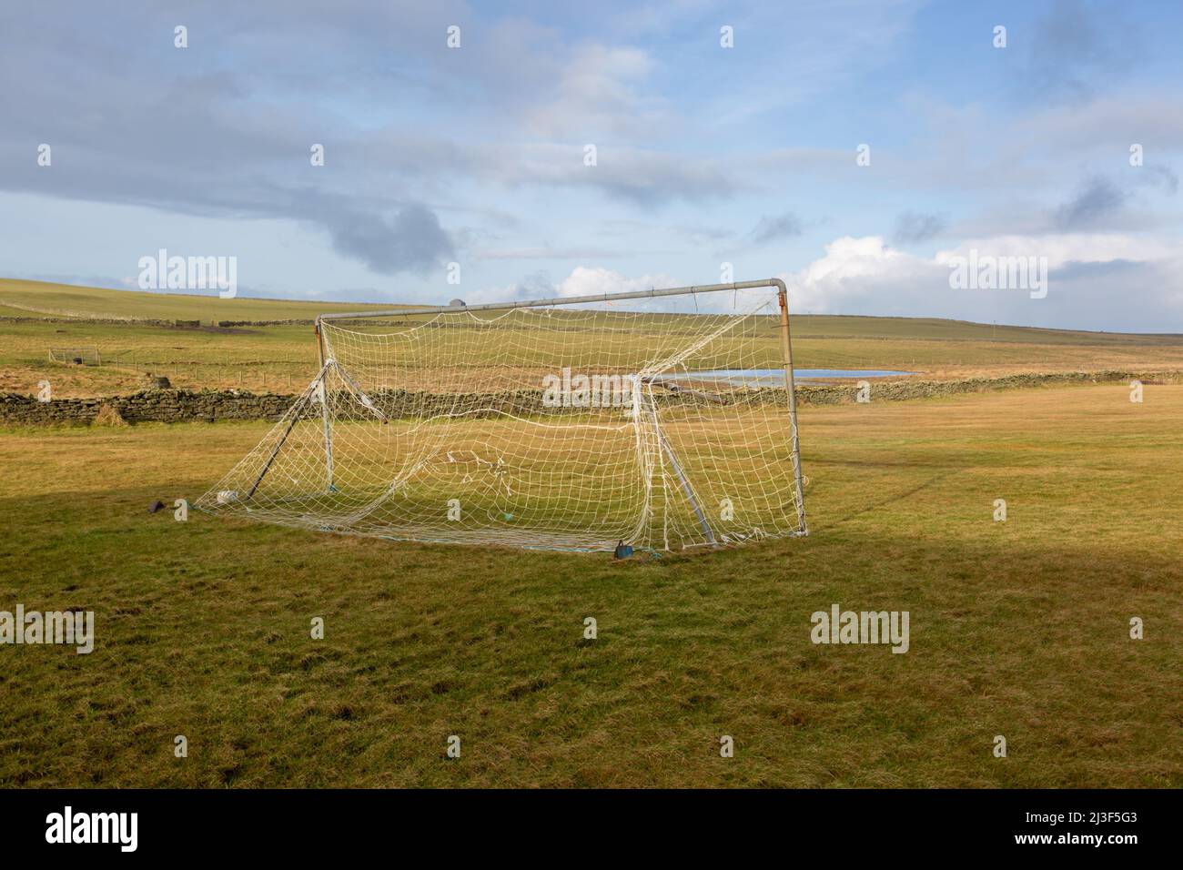 Remote football field or playing field, Papa Westray, Orkney Islands, UK Stock Photo