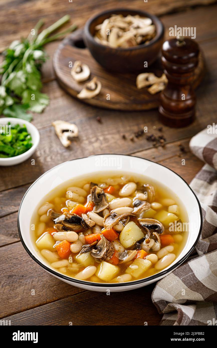 Mushroom soup with kidney bean, potato and carrot Stock Photo Alamy