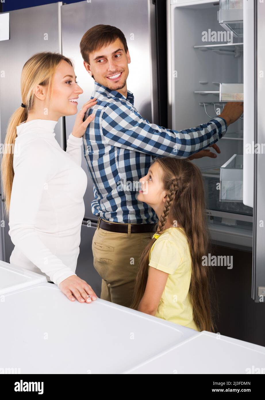 Family selecting refrigerator Stock Photo
