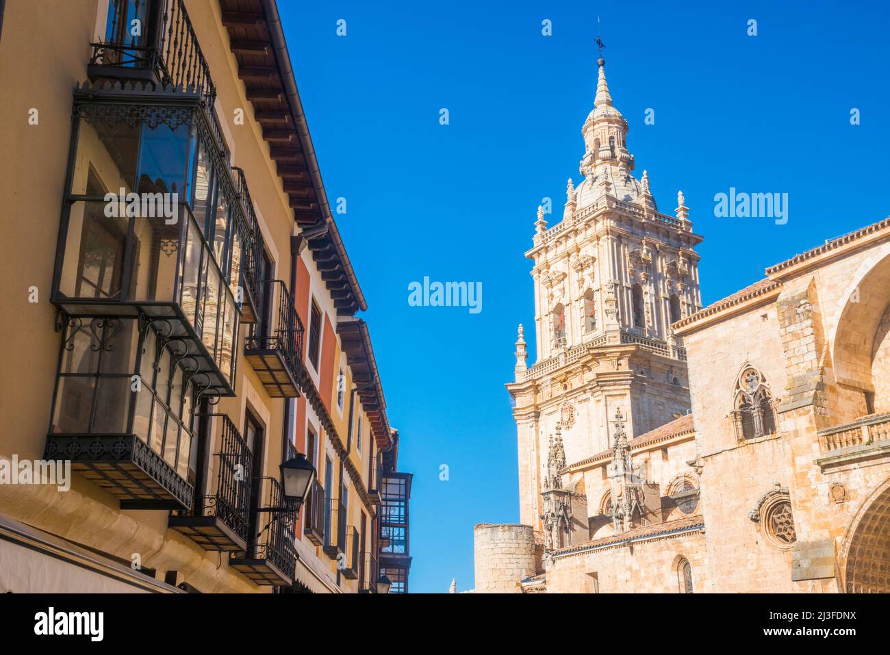 Facade of house and cathedral. Burgo de Osma, Soria province, Castilla Leon, Spain. Stock Photo