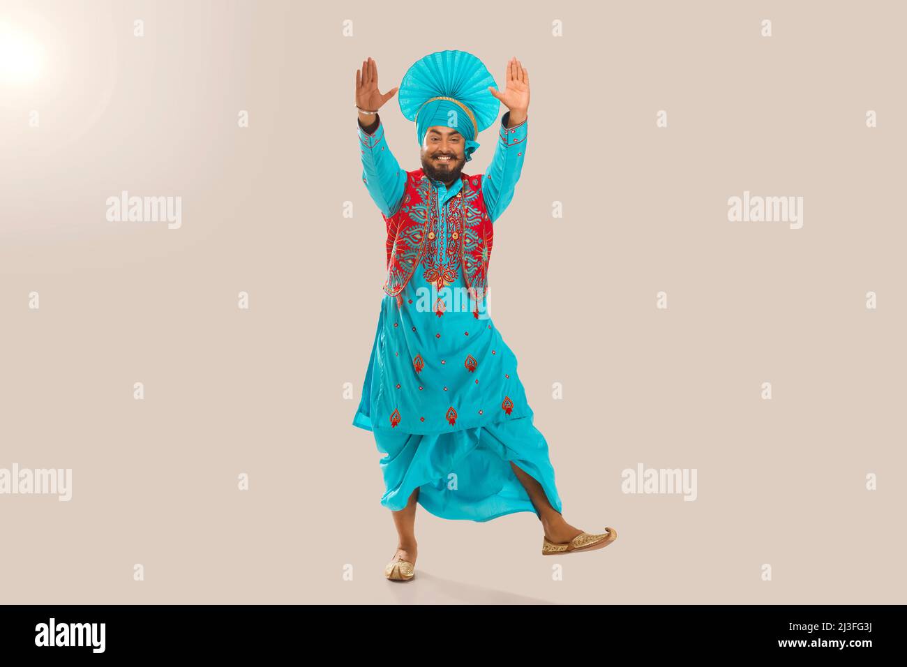 Sikh Man performing bhangra during Baisakhi Celebration Stock Photo