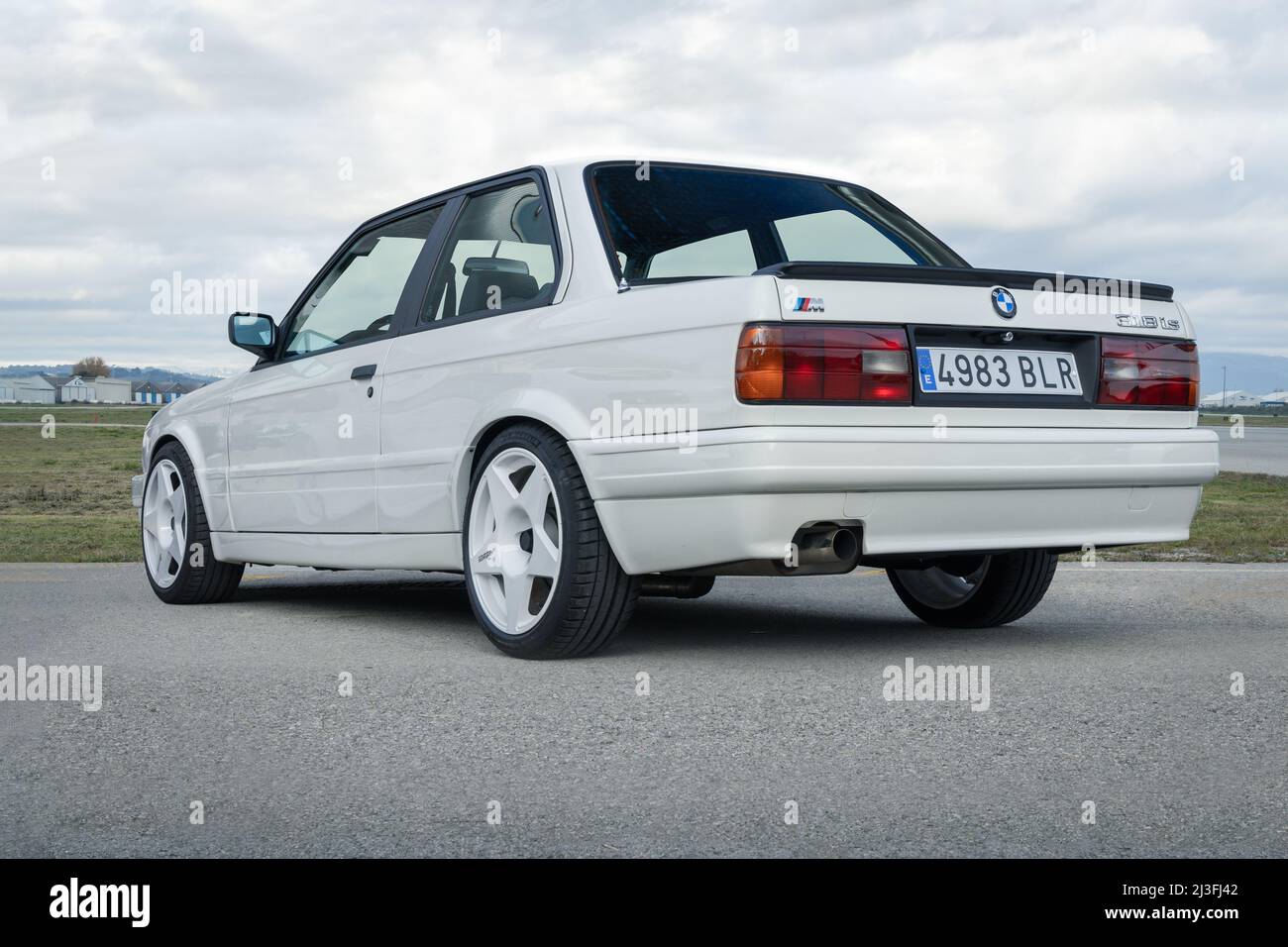 SABADELL, SPAIN-OCTOBER 9, 2021: BMW 318 is (E30) two-door sedan (second generation of BMW 3 Series), rear view Stock Photo