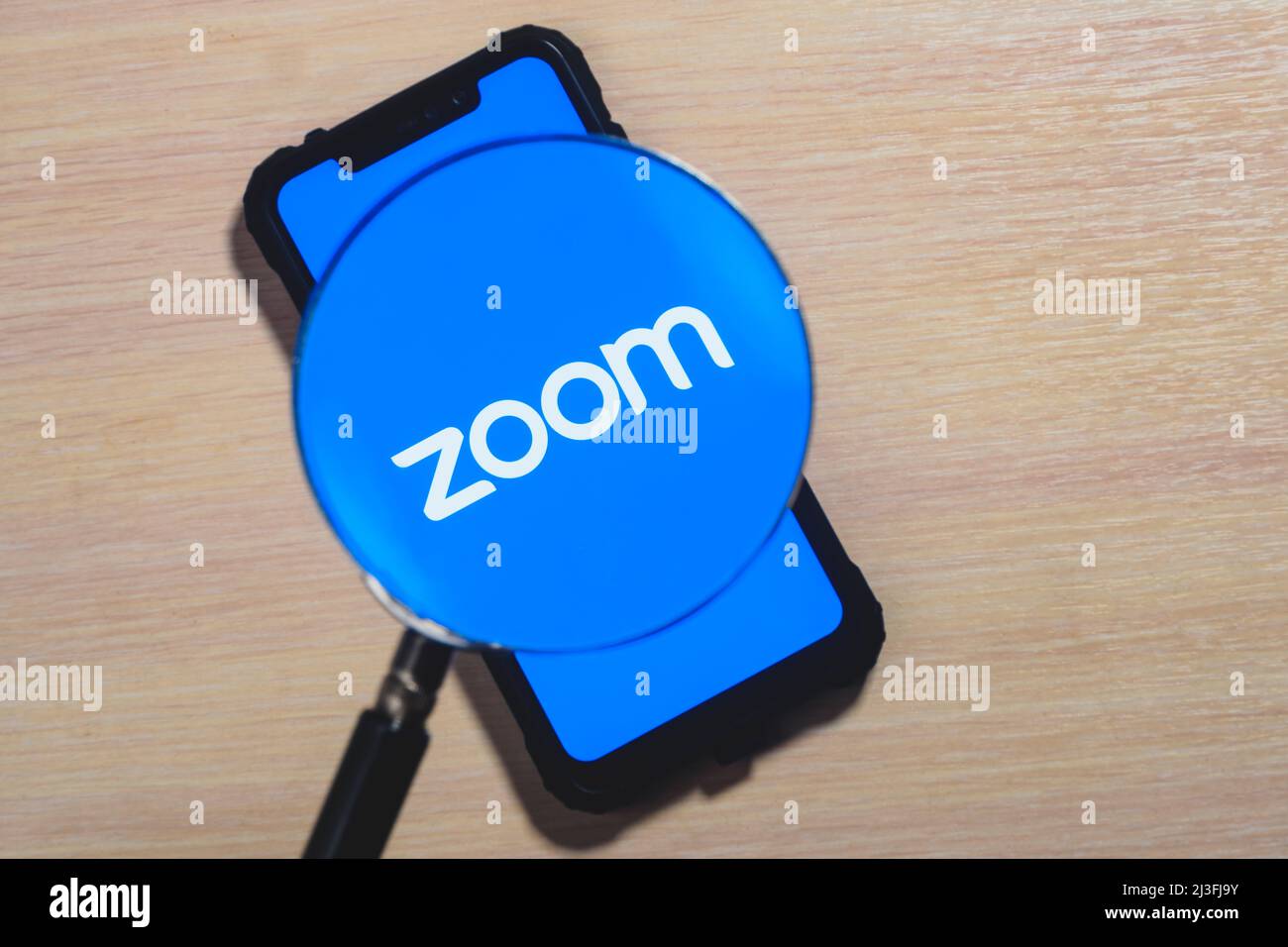 Zoom app logo on the screen smartphone closeup. Zoom Video