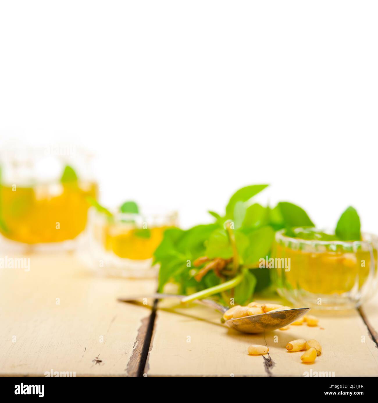 Arab traditional style mint and pine nuts tea called at tay Stock Photo ...