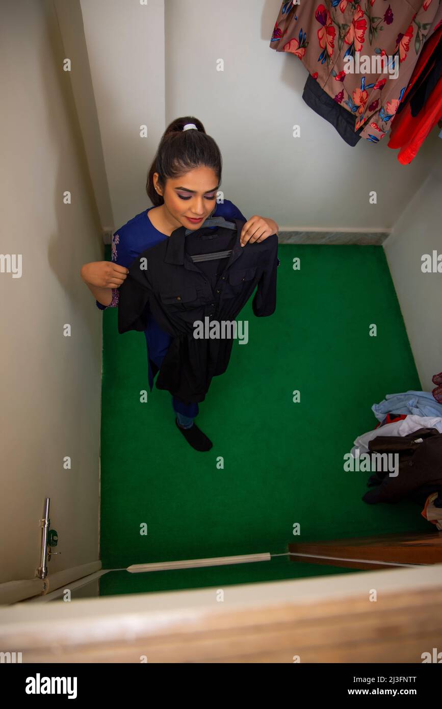 Top view of a woman in trial room with new dress Stock Photo Alamy